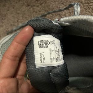 Sauconny tennis shoes.